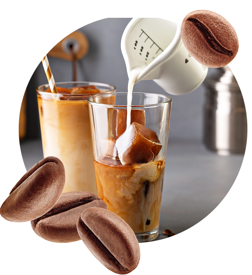 Two glasses of cold brew coffee with fresh roasted coffee beans