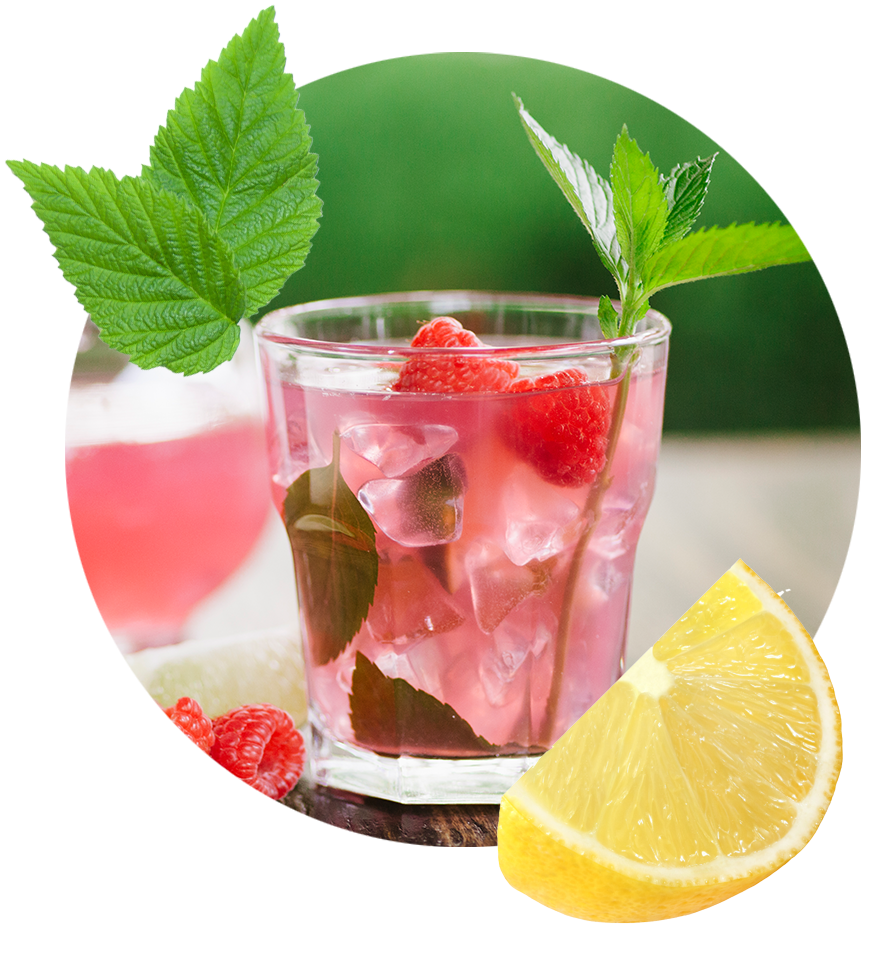 A refreshing glass of raspberry lemonade with a lemon slice with functional benefits like l-theanine