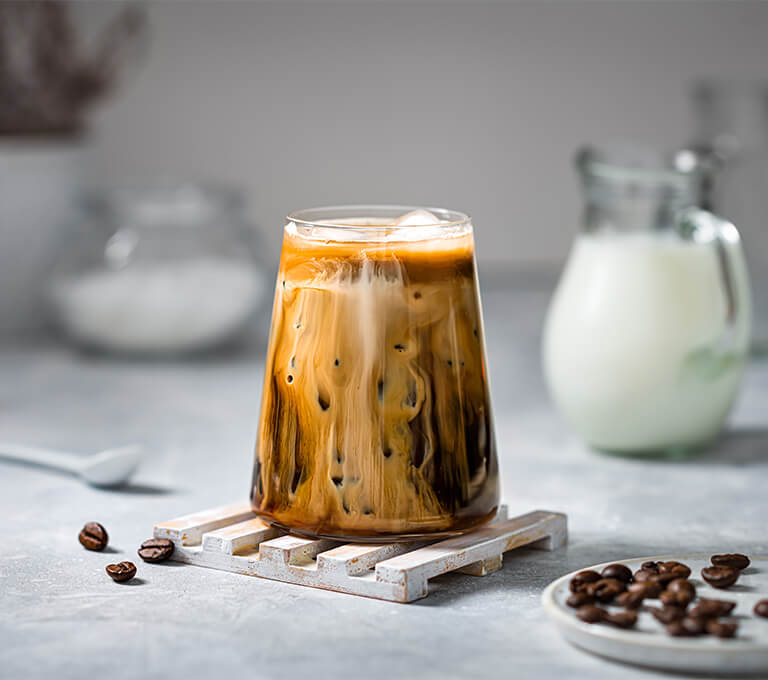 A cup of coffee sitting on top of a table