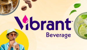 man standing in front of a sign that says vibrant beverage, representing the manufacturing of FFP now known as Vibrant Ingredients